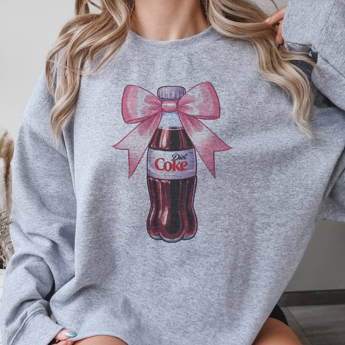 Diet Coke Pink Bow Soda Bottle Graphic Sweatshirt